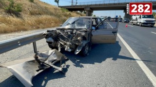 İş makinesine çarpan otomobilin sürücüsü yaralandı
